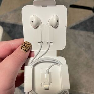 Apple headphones and charger